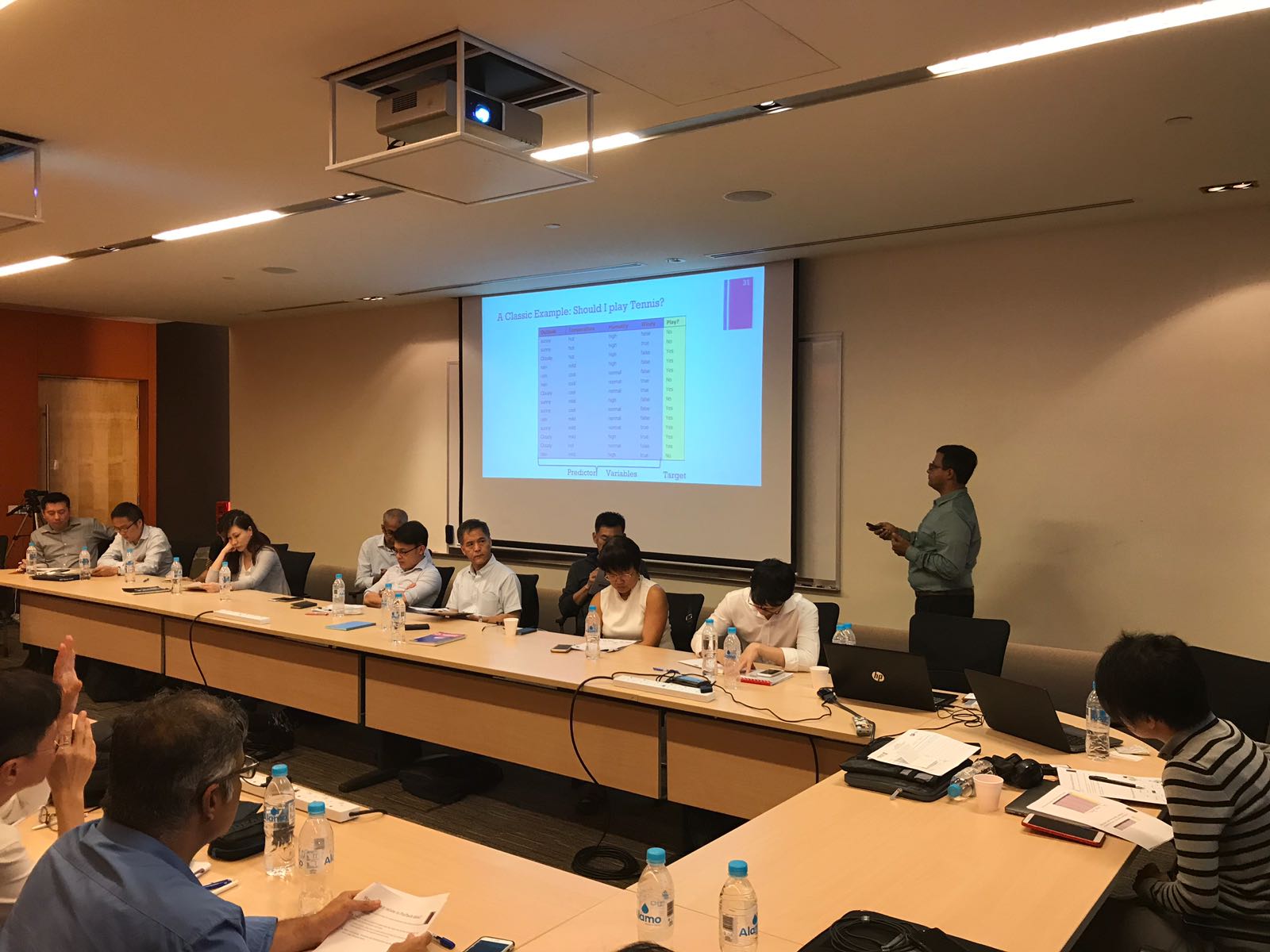 Presenting a data table slide to a workshop audience